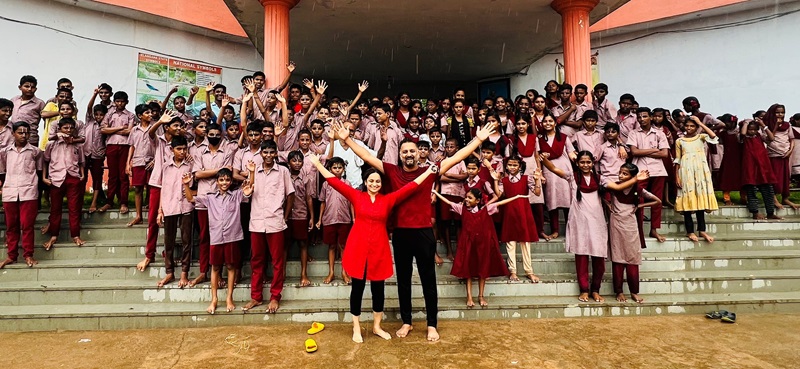 Vijay and Amita Aviur celebrate alongside schoolchildren